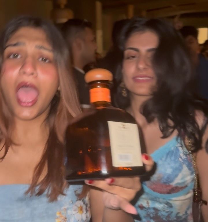 Two guests mid-laugh on a pub crawl